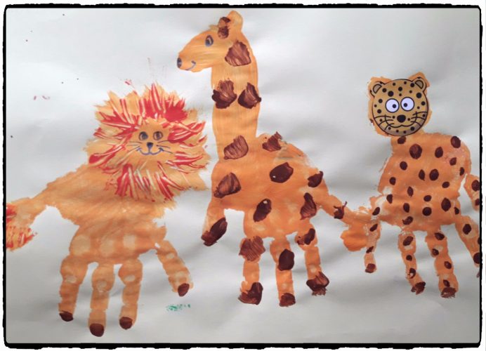 Lion, léopard et girafe en empreintes de mains