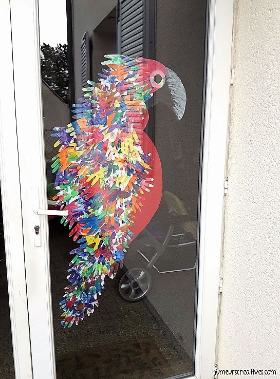 décoration de notre porte d'entrée avec le perroquet