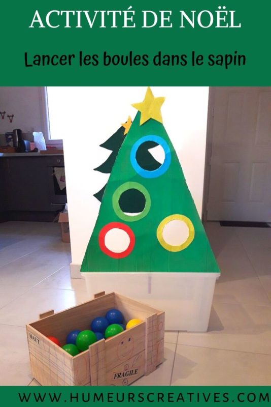 Jeu de Noël pour les enfants  : lancer de boules dans le sapin