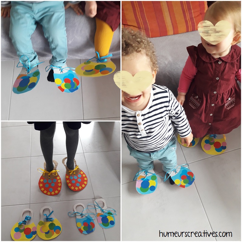 les enfants ont essayé leurs chaussures de clown fait main