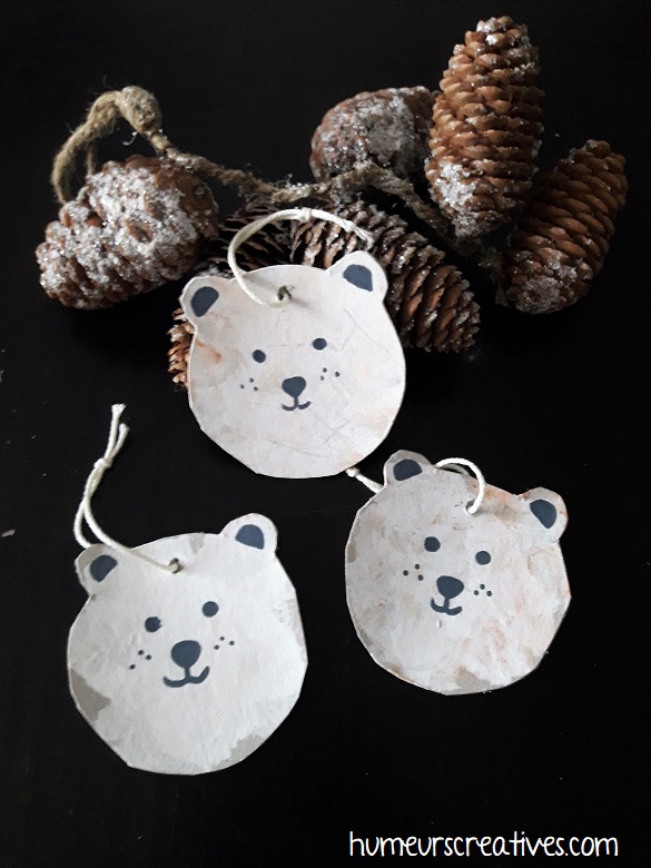 suspensions de noel en forme d'ours blanc réalisées par les enfants